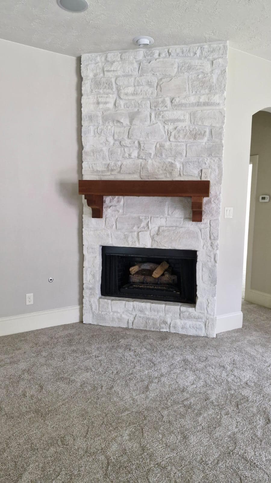 Fireplace repainted by HAB Remodeling & Construction
